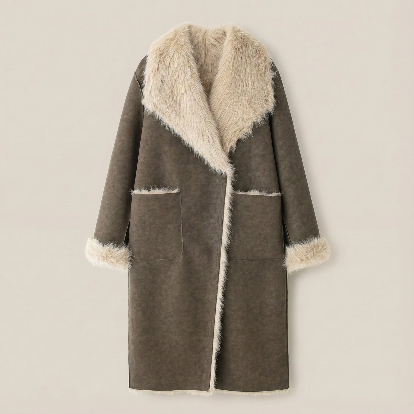 Brown coat with fur trim on a beige background