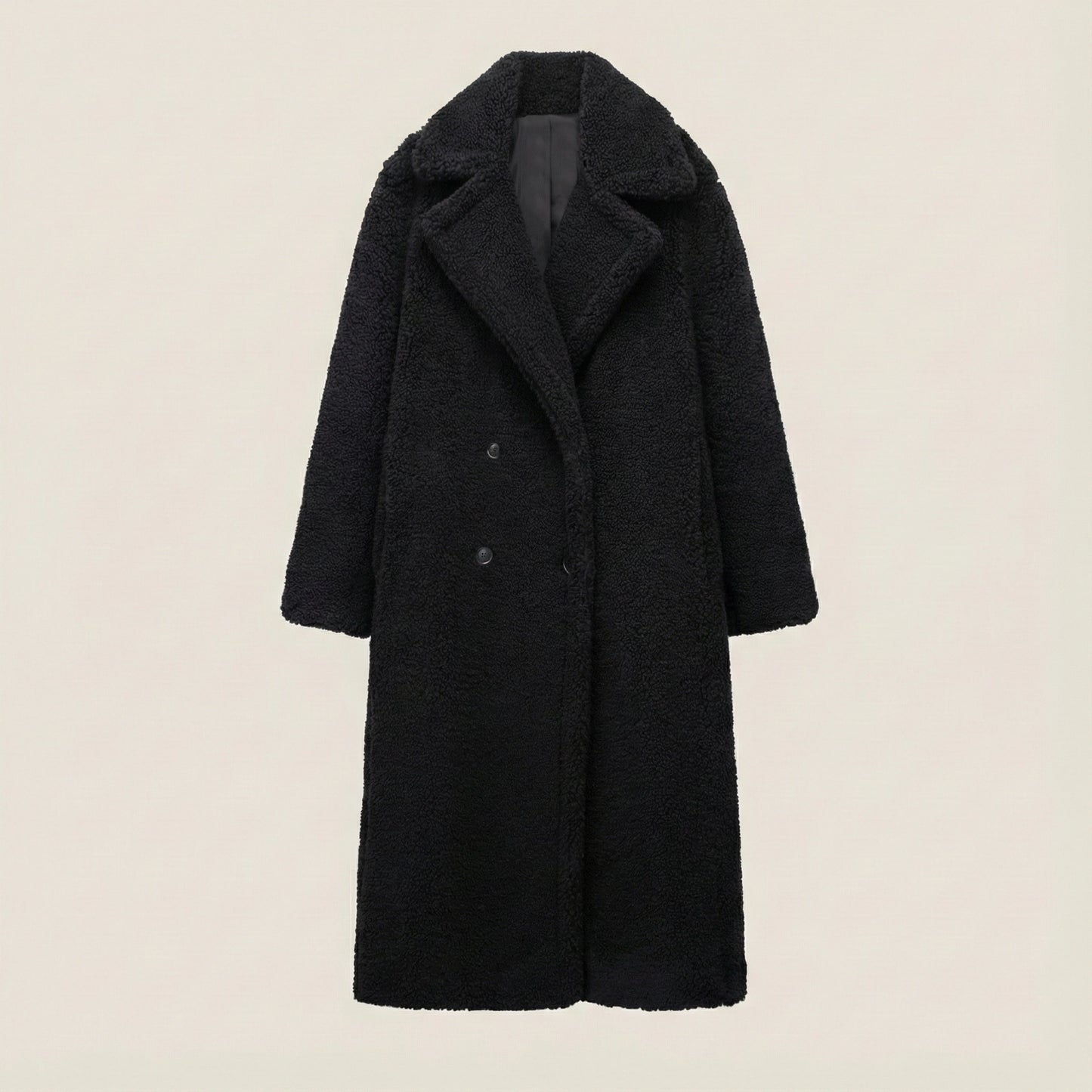 Black coat on a beige background