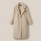 Beige coat on a beige background