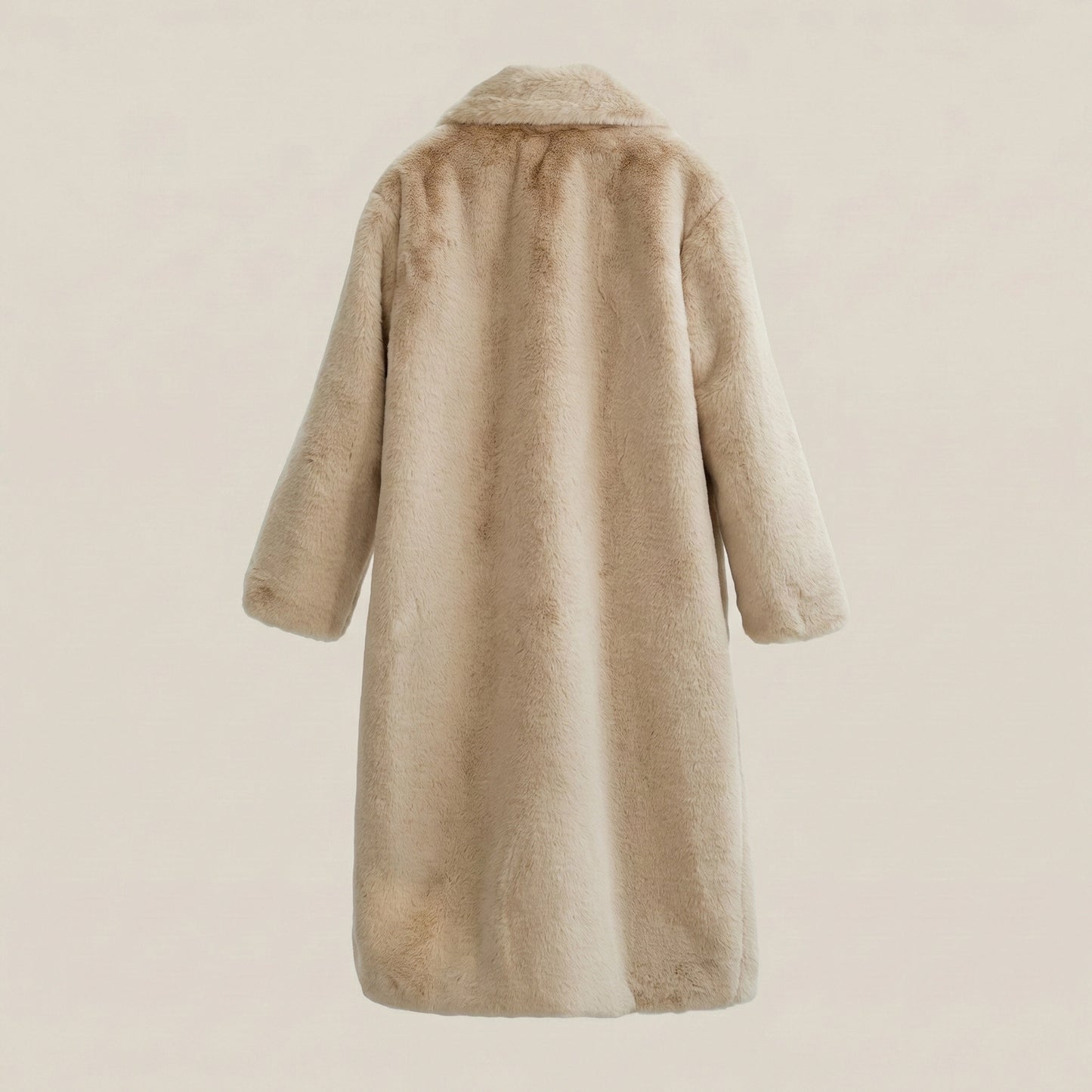 Beige fur coat on a beige background