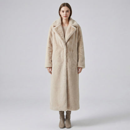 Woman wearing a long beige coat with a fur collar on a white background