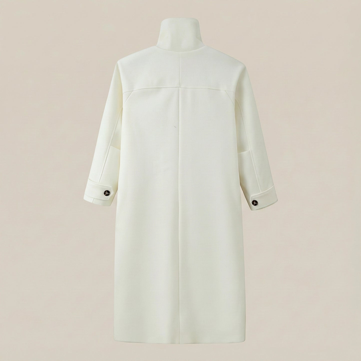 White coat on a mannequin against a beige background